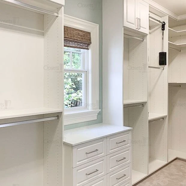 An image of a Walk In Closet with Glass Fronts & Laundry - Oxford White slide 5