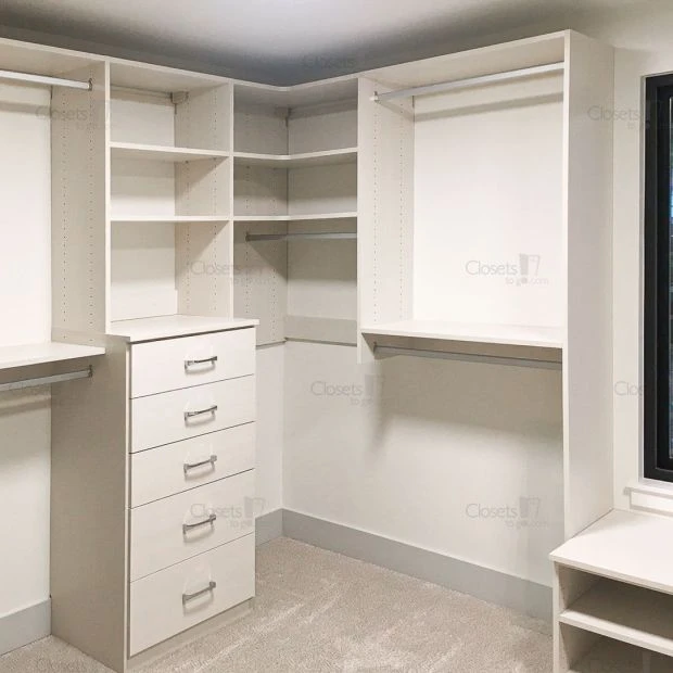 An image of a Personalized Closet System in Oxford White | His & Hers Hutches, Corner Shelving, Bench Area & More slide 2