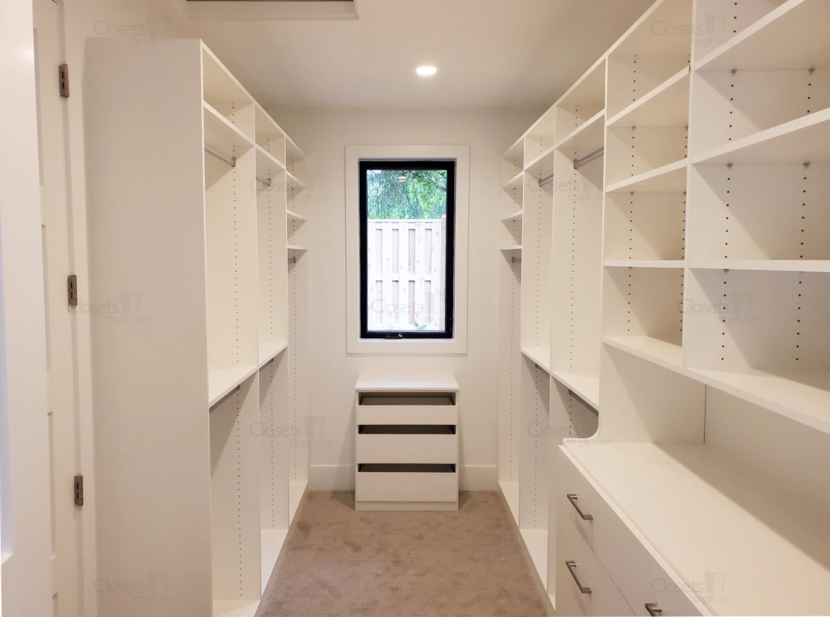 An image of a Walk In Closet with Window - Oxford White