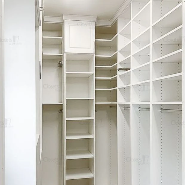 An image of a Walk In Closet with Glass Fronts & Laundry - Oxford White slide 4