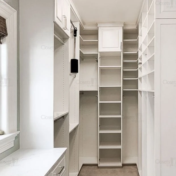 An image of a Walk In Closet with Glass Fronts & Laundry - Oxford White slide 6